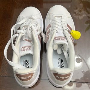 Adidas brand new, pristine condition white with rose colored accents